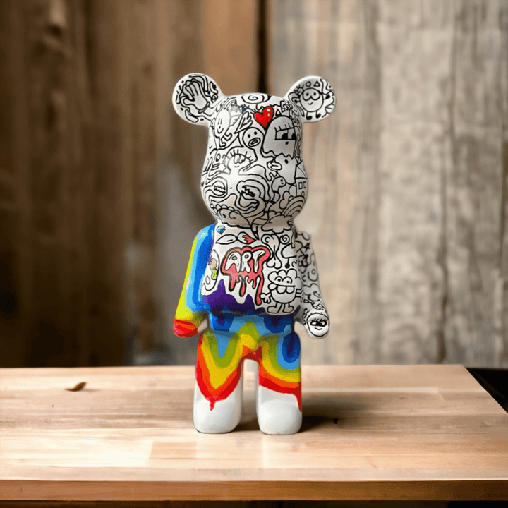 Desing Rainbow Doodle Bear Yükseklik: 27 cm Genişlik: 12 cm Derinlik: 9 cm Materyal: Alçı Desing Rainbow Doodle Bear - hiandco.com.tr Hi Sculpture - Pera Heykel | Pera Sanat
